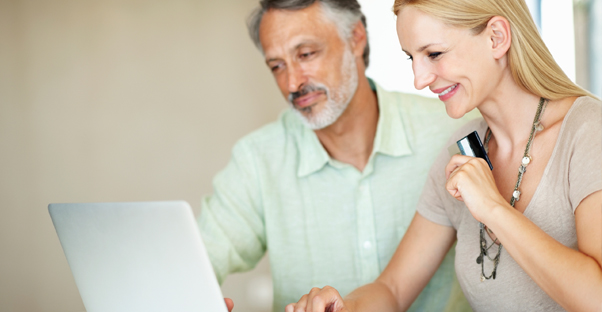 A couple working with an online stock broker