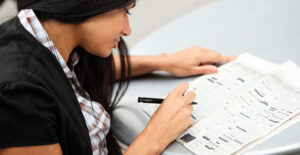 Woman deciding whether or not to buy renters insurance