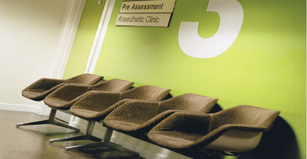 a waiting room to see a doctor about genital warts