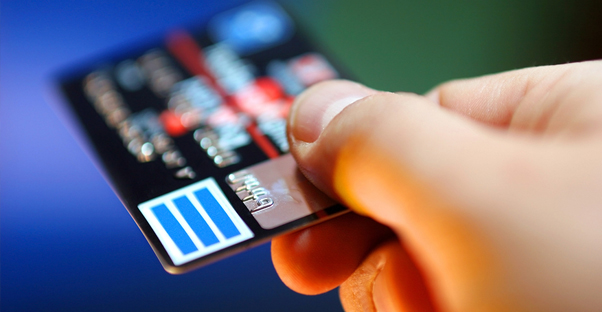 Woman charging a purchase to her credit card