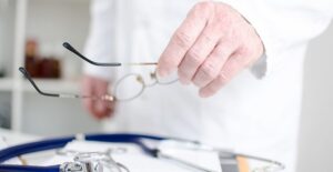 A doctor prepares for a diagnostic laparoscopy
