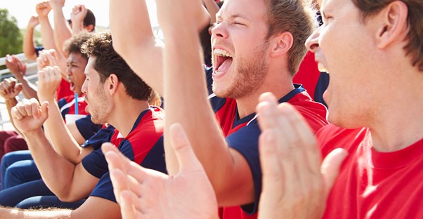 Fans cheer on their favorite team