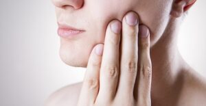 A woman experiences trigeminal neuralgia