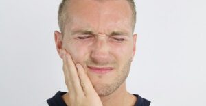 A man experiences trigeminal neuralgia