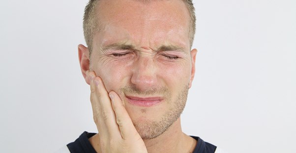 A man experiences trigeminal neuralgia