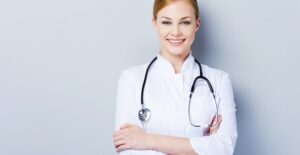 A doctor prepares her patient for a tonsillectomy