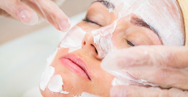 A woman treats her skin