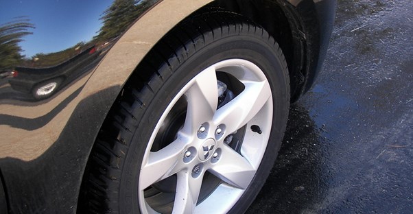 the back wheel of a new car