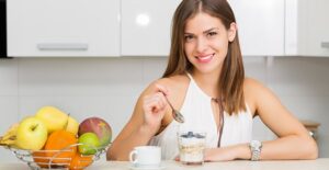 A woman eating probiotics