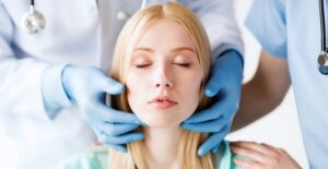 A woman being treated for throat cancer