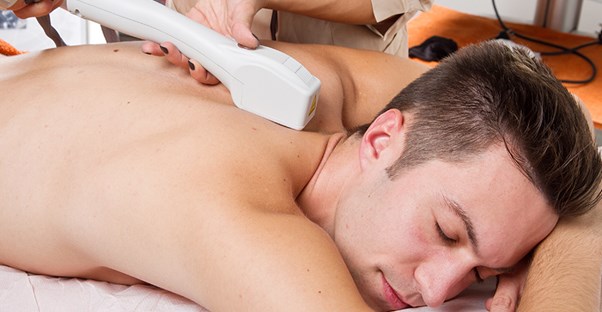 A man receiving electrolysis