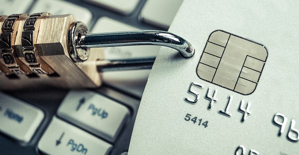 Credit card with a chip and pin and a padlock