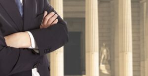 Immigration Lawyer standing outside of a courthouse