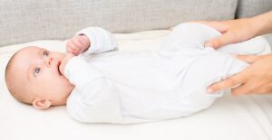A baby has its colic treated