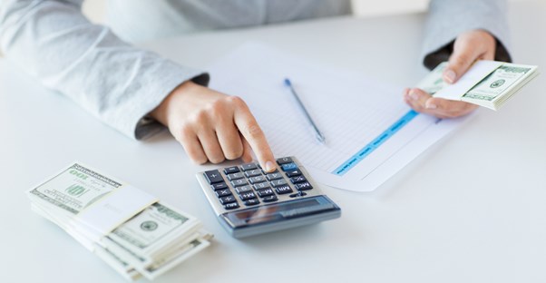 businessperson consulting a tax service