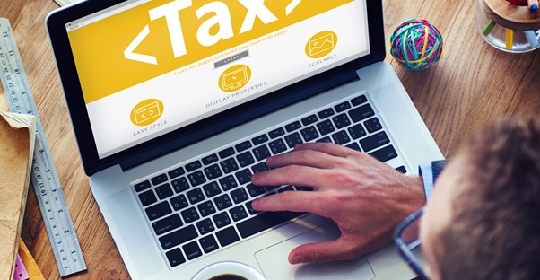 Man researching tax software