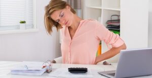 A woman feels the effects of spinal stenosis
