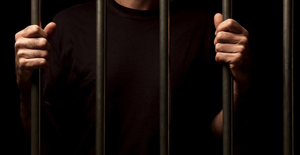 Man behind bars