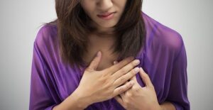 A woman experiences chest pain