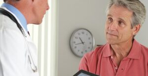 A doctor and patient discuss gout