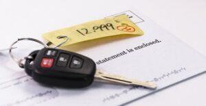 Car key with a price tag attached