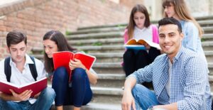 students studying outside at community college