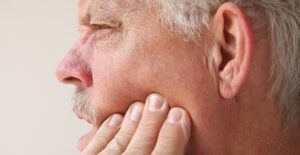 a man experiences tmj pain