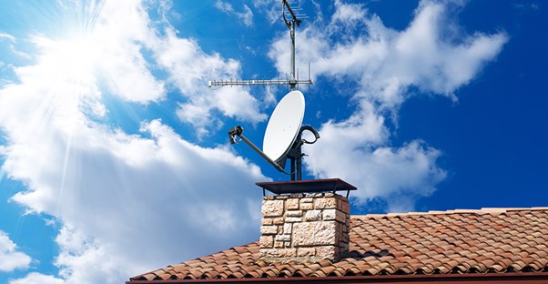 satellite dish on top of a roof