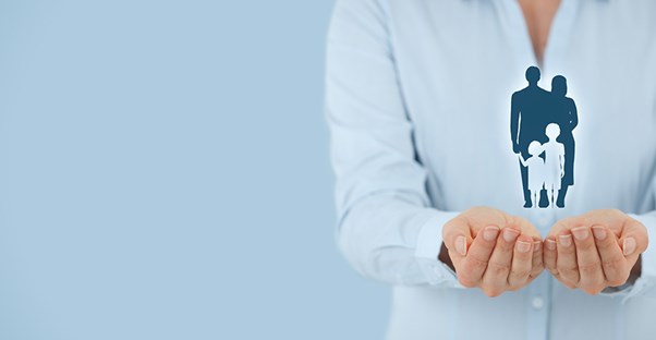woman holding family in hands