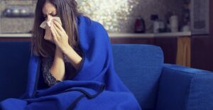 A woman suffers from a chest cold