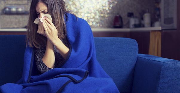 A woman suffers from a chest cold