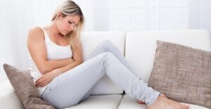 A woman experiences the symptoms of uterine cancer