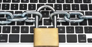 keyboard with chain and lock around it