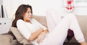 A woman experiences period pain