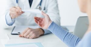 A doctor and patient discuss TSS