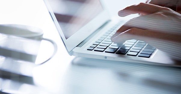 typing on a laptop