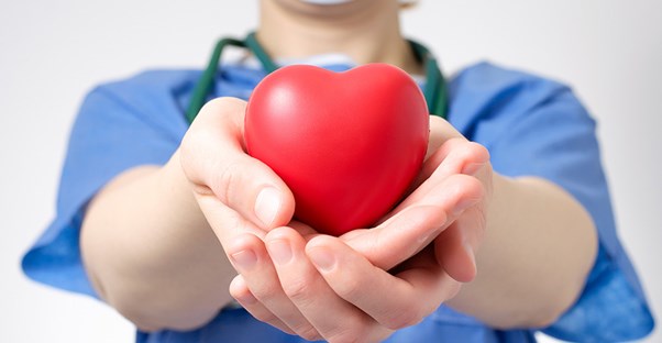 Yet another doctor holding a fake heart