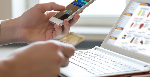 person inputting credit card information online