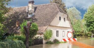flooded home in a neighborhood