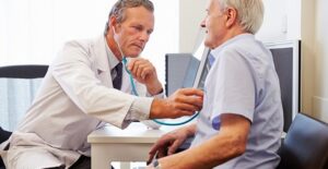 A doctor examines his patient