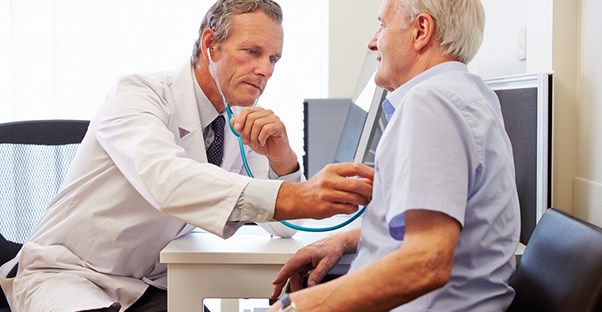 A doctor examines his patient