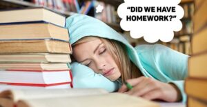 Young student falls asleep in the library