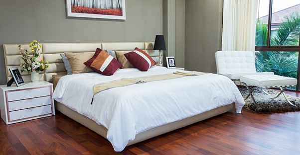 A bedroom is freshly organized and ready for an Airbnb guest.