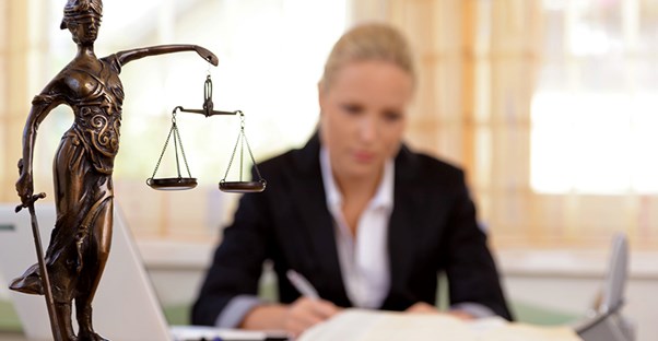 lawyer working on workplace harassment case
