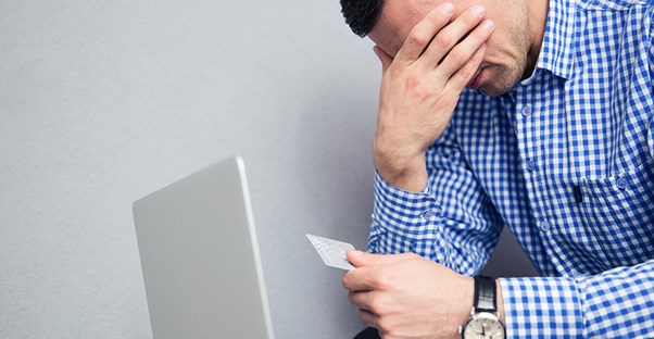 guy frustrated after getting scammed after tax season