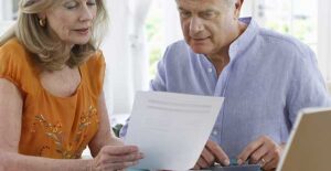 Couple reviewing their 2014 taxes