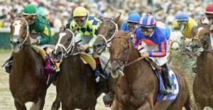 Horses race in the Kentucky Derby
