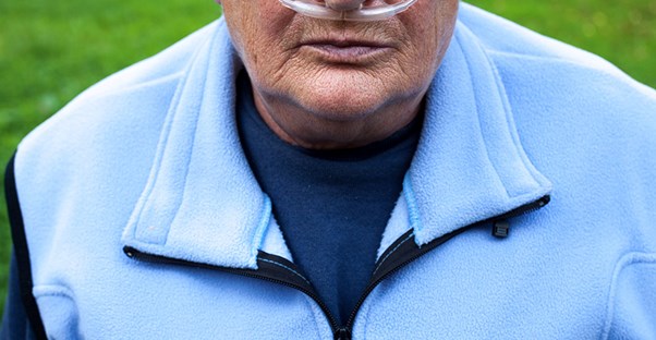 A man uses oxygen therapy