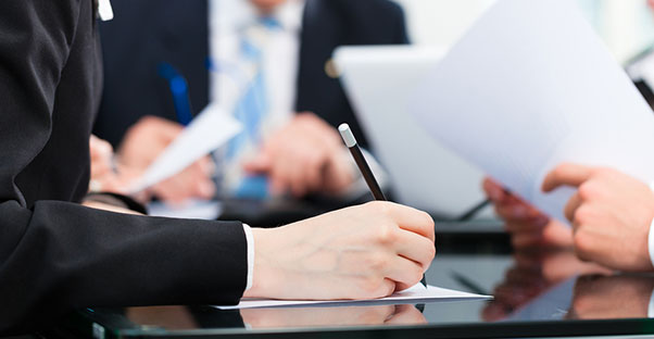 Businessman signing up for a s-corp status