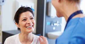 A doctor and patient discuss hammer toe